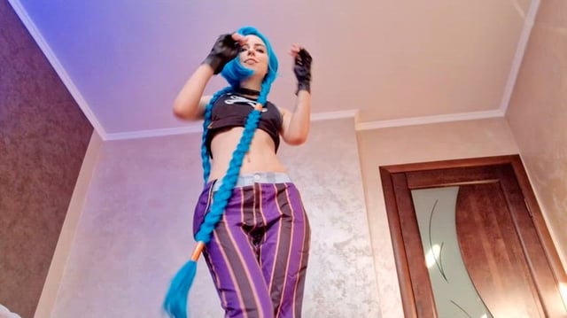 Lina Moore as Naughty Jinx playing with her holes