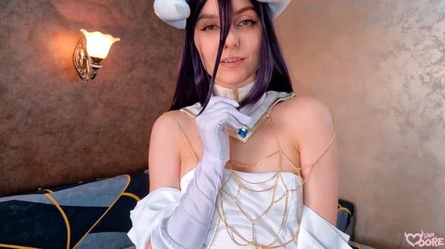 Lina Moore with cosplay of Albedo playing with her holes